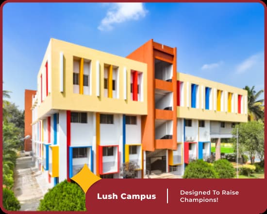 Lush campus of Orchids International School, Hennur Road, a top CBSE school in Bangalore, with green grounds and modern facilities.