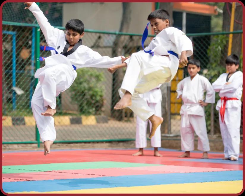 Students performing Taekwondo drills at Orchids, The International School, Kurla campus
