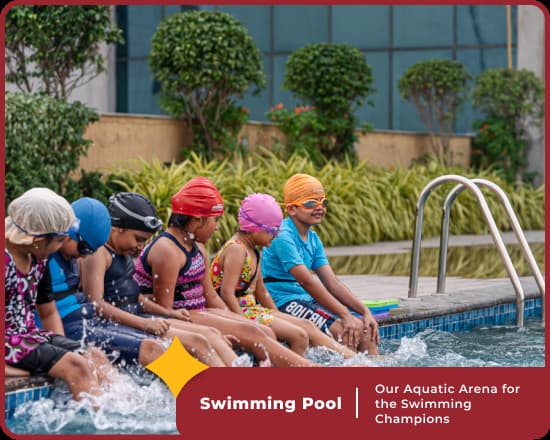 Swimming lessons at Orchids New Town's pool, top CBSE school in Kolkata, enhance skills.